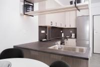 Kuchnia lub aneks kuchenny w obiekcie Urban Chic luxury at the city center