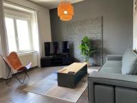 Część wypoczynkowa w obiekcie Appartement avec climatisation proche du centre