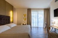 Posteľ alebo postele v izbe v ubytovaní Relais Masseria Caselli