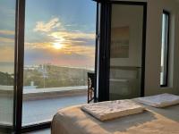 A bed or beds in a room at Souvala /Aegina. Excellent location Luxury villa.