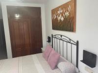 A bed or beds in a room at El SOL del SUR