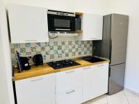 Kuchnia lub aneks kuchenny w obiekcie Garibaldi 118 Luxury Apartment