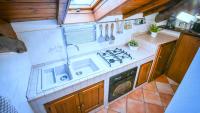 Kuchyňa alebo kuchynka v ubytovaní NEW! Suite Apartment