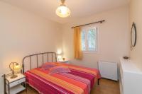 Postel nebo postele na pokoji v ubytování Anastasia Home