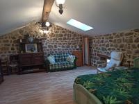 Posteľ alebo postele v izbe v ubytovaní Gîte le rocher du château de Retourtour