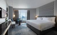Ein Bett oder Betten in einem Zimmer der Unterkunft Centara Grand At CentralWorld