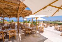 En restaurant eller et andet spisested på The Cascades Golf Resort, Spa & Thalasso