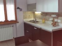 Kuchyňa alebo kuchynka v ubytovaní casa papillon