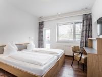 Posteľ alebo postele v izbe v ubytovaní Kolpinghaus Salzburg - SommerHOSTEL