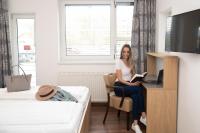 Televízia a/alebo spoločenská miestnosť v ubytovaní Kolpinghaus Salzburg - SommerHOSTEL