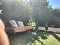 Ogród w obiekcie Maison dans une résidence de vacances