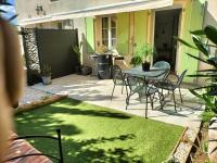 Ogród w obiekcie Maison dans une résidence de vacances
