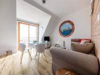 Televízia a/alebo spoločenská miestnosť v ubytovaní Beautiful apartment with sea views
