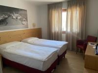 Posteľ alebo postele v izbe v ubytovaní Hotel Nevada
