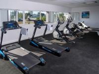 a row of exercise bikes in a gym at Westotel Le Pouliguen in Le Pouliguen