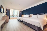 Ένα ή περισσότερα κρεβάτια σε δωμάτιο στο CHECK inn Select Taipei Nangang