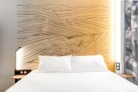 Postel nebo postele na pokoji v ubytování B&B HOTEL Paris Ivry Quai de Seine