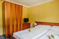 Łóżko lub łóżka w pokoju w obiekcie Haus Blueberry - Baranek Resorts