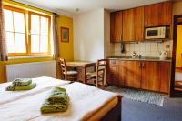 Łóżko lub łóżka w pokoju w obiekcie Haus Blueberry - Baranek Resorts