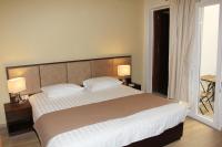 Postel nebo postele na pokoji v ubytování Rea Hotel
