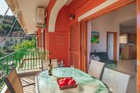 A balcony or terrace at Golden Flower's Apartment