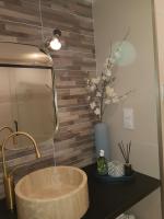 Kúpeľňa v ubytovaní le J&J Appartement spacieux climatisé en centre ville