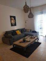 Posedenie v ubytovaní le J&J Appartement spacieux climatisé en centre ville