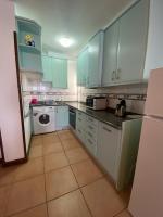 Kuchyň nebo kuchyňský kout v ubytování By The Sea Apartment Corralejo