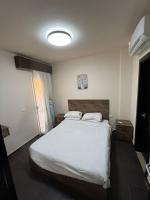 Postel nebo postele na pokoji v ubytování Porto Sharm vib suites