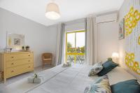Postel nebo postele na pokoji v ubytování Casa Gaivota