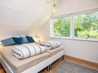 Postel nebo postele na pokoji v ubytování 5 person holiday home in Frørup-By Traum
