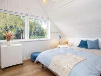 Postel nebo postele na pokoji v ubytování 5 person holiday home in Frørup-By Traum