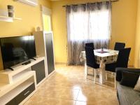 Televízia a/alebo spoločenská miestnosť v ubytovaní Daniela apartament