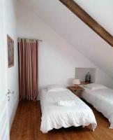 Posteľ alebo postele v izbe v ubytovaní LA VILLA GABRIELLE - ENTRE BOURG ET PLAGE