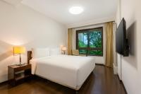 A television and/or entertainment centre at Belgravia Serviced Residence Wuxi