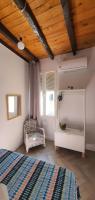 A bed or beds in a room at EN EL CORAZON DE GRANADA