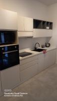 Kuchyňa alebo kuchynka v ubytovaní P&P Central Apartment