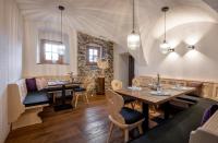Posezení v ubytování NEUWIRT - Boutiquehotel & Wirtshaus