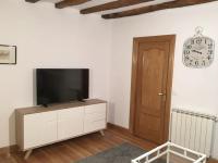 Televízia a/alebo spoločenská miestnosť v ubytovaní Cómodo apartamento en la Parte Vieja, Old Town