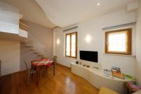 Televízia a/alebo spoločenská miestnosť v ubytovaní Siena UpTown - Sabrina's Cozy Apartment
