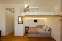 Posteľ alebo postele v izbe v ubytovaní Siena UpTown - Sabrina's Cozy Apartment
