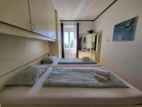Posteľ alebo postele v izbe v ubytovaní Apartment Audrey