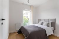 Postel nebo postele na pokoji v ubytování S35 Apartments Gdynia Orłowo