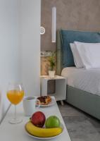 Posteľ alebo postele v izbe v ubytovaní Iconic Athens Suites