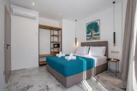 Posteľ alebo postele v izbe v ubytovaní Iconic Athens Suites