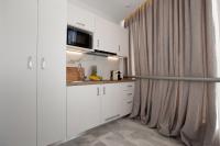 Kuchyňa alebo kuchynka v ubytovaní Iconic Athens Suites