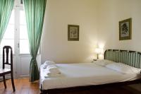 Postel nebo postele na pokoji v ubytování Hotel Omiros