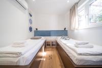 Posteľ alebo postele v izbe v ubytovaní Villas Terraneo
