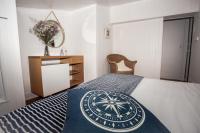 Łóżko lub łóżka w pokoju w obiekcie LA MARINA amplio apartamento en pleno centro de Hondarribia