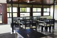 En restaurant eller et andet spisested på Hotel La Gowri, Coorg